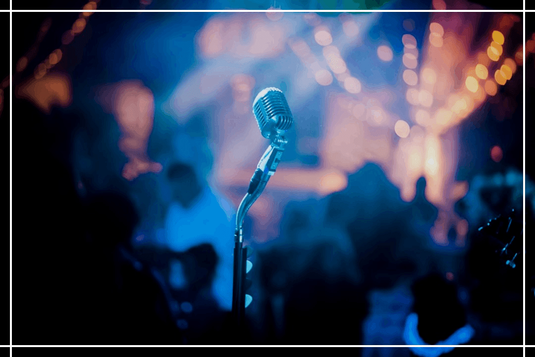 a microphone in front of a crowd of people